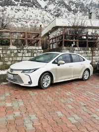 كورله هايبرد مديل 2025 رقم بغداد بسمي سياره فول مواصفات داخل احمر جلد ...