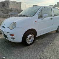 QQ2012 سنوية جديدة  كوبون ورقي مكينة كير  ما بيهم شي طخم تايرات  طخم ا...