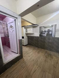 شقة طابق أول • غرفتين نوم • الشعب شارع الصحة