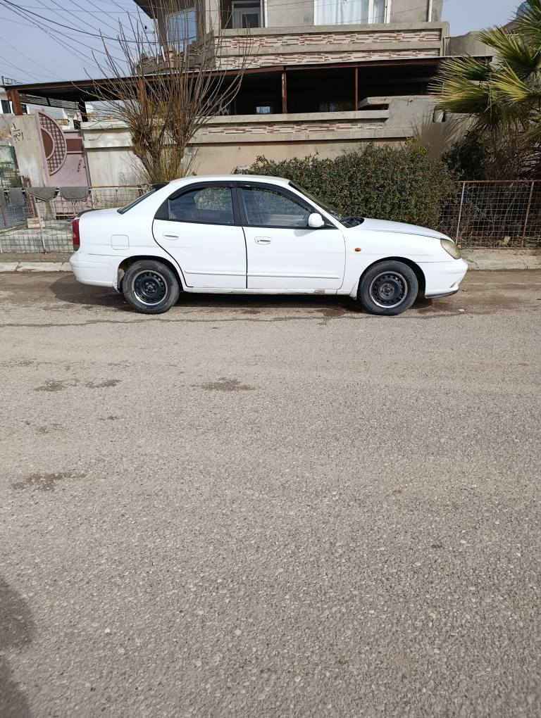 دایو نوبرا2 مودیل 99تبرید سارد و گەرم ناو فۆرمیکا مەکینەو گێڕ بە شەرت پەڵە پەڵە معجونی هەیە لەسەر ساغی سنوی بەسەر چووە کۆبۆنی بەنزینی هەیە بەشرتی تحویل رقم مبایل *********** شمشمل, السليمانية
