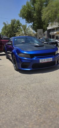 تشارجر R/T • V8 5.7 • ١٠٠ الف ميل