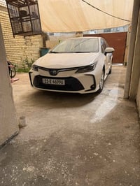 كورلا موديل 2024 للبيع فول كشن كهرباء ماشيه 21 مكفوله  مكينه 1800 هايب...