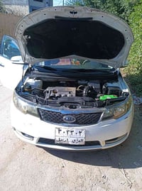 سيراتو 2013 • أبيض • ضربة ورا السائق