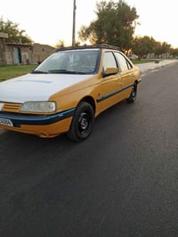 سياره بيجو رقم بغداد انكليزي امصفره كير ومحرك كورله اوتماتيك داخلها خي...