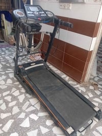 جهاز جري • تردميل