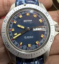 ساعة سويسري • السبعينات • تكويك وأوتوماتك