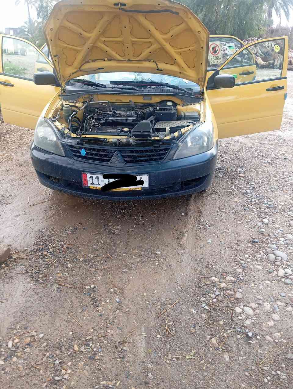 لانسر موديل 9 مصفرة هيئة وغرامات سيارة حلوة وبعد احلاى من صورة مكينة 1500 قبغ اسود  جديدة ضربة بالصندوك بس ما واصلة جامرلوغات مو قوية مصبوغ عام اثر جراد غير شي ماكو
الي يريد يتصل ***********
