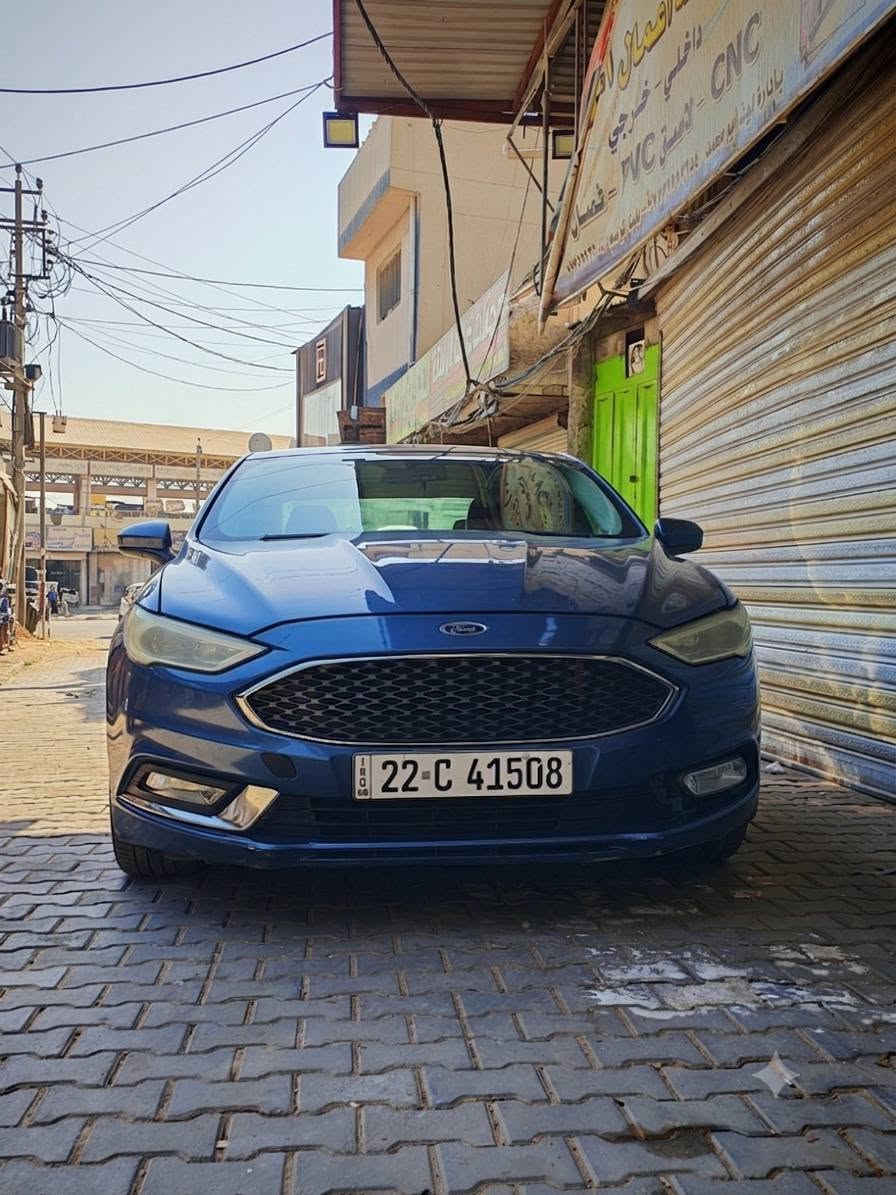 السلام عليكم رايد مراوس ب اكسبدشن 12 او 13 نظيفة بانزين او غاز عندي فورد فيوجن 18 محرك 2500 فئة se 
المواصفات 
تشغيل عن بعد 
تحكمات ستيرن ومثبت سرعة 
صعود ونزول الجام من البصمة 
كشنات جلد
داخل جلد اسود 
تبريد قطعتين طقس منفصل 
شاشة كبيرة وشاشتين بالعدادات 
كشنات كهرباء 
حساسات خلفية وكاميرا دوارة 
ويل 18 
ماشية 101 مايل يعني 162 كيلو
محرك وگير بحالة ممتازة والگير اغيرلة هايدروليك كل 40 الف 
بيها قطعتين فقط طرف البنيد والجاملغ اليسار السيارة بدون ايرباك 
وصدرها كامل جديد
بيها نقوصات كلش بسيطة 
صورة الحادث بالمنشور 
رقمها اربيل
مكانها بغداد
للاسفسار ***********
