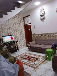 مشتمل • ١٠٠م • السفحة الثانية