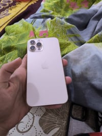 IPHONE 12 PRO MAX   ذاكرة || 256  مبدل بطارية حالتها 100 الجهاز مابي ش...