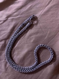 زنجيل مثل ماواضح عدك وزنه 84غرام قفل قفل 4الغرام مكاني مدينت آلصدر 077...