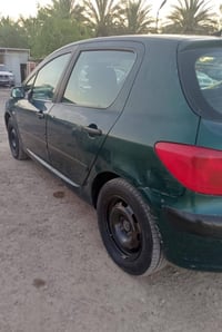 سياره بيجو فرنسي رقم بغداد  الموديل 2005 السعر خاص ‏‪07719564718‬‏