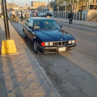 بي ام ١٩٩١ • جلد اسود • رقم بغداد