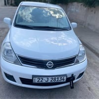 نيسان تيدا • ٢٠١٣ • ٢٢٢٠٠٠ كم