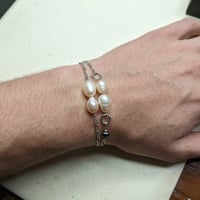 فضة ٩٢٥ • لؤلؤ طبيعي • ٢٥ جرام