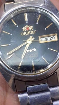 ساعة • أوتوماتيك