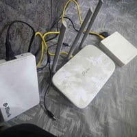 شرط اصلي TP-Link مع جهاز استقبال الفايبر الضوئي. وجهاز  Mini UPS للراو...
