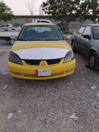 لانسر ٢٠١٠ • محرك ١٫٥ • رقم بغداد
