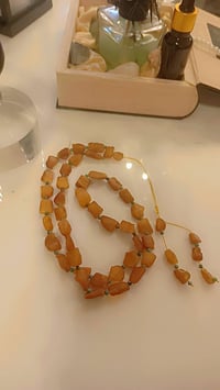 عقد كهرب • كهرب خام • أصلي