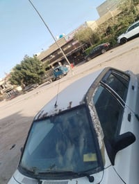 سايبا موديل ٢٠٠٩ رقم بغداد بأسمي  مصبوغه حزام جماليه ومرفق صور قبل الص...