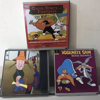 ٣ بكرات • سوبر ٨ ملم • أسود وأبيض