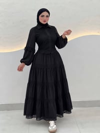 طقم تنورة • تول مبطن • مقاسات ٣٨-٥٠
