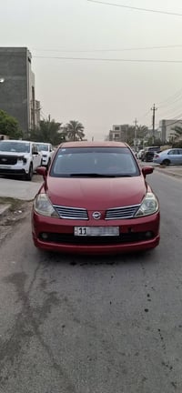 نيسان تيدا موديل 2007 رقم بغداد دولي بأسمي .  كير محرك نضيفات (محرك 16...