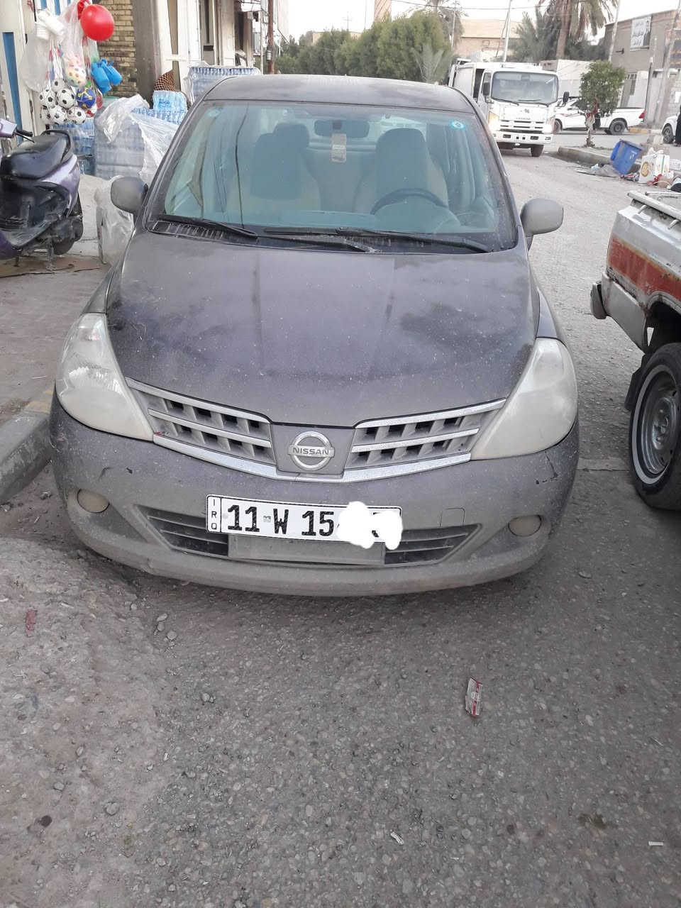 نيسان تيدا خليجي 2009 ( اللون رصاصي) مكينه كير حداديه تخم تاير كله جديد تدفئه تبريد جاهزه سنتر لوك ريموت السياره بلاديه بيه فقط حاملغ امامي بيه تصليح  سنويه جديده هزه جديده باسمي مكان السياره الديوانيه السعر المطلوب 70 وبيه مجال بسيط للاستفسار على *********** و***********
