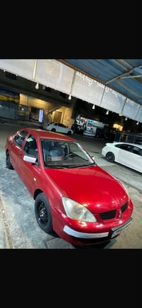 لانسر موديل 2007 خليجي بيهه 5قطع اثر جراد  وبيهه الهلالات الخلفيه معمر...