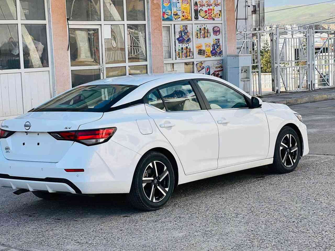 السلام عليكم 
نيسان سنترا موديل :2024 🔥
اللوان :ابيض  
سعر :118 
حجم المحرك : 2.0L ( 4,سلندر )
سياره كامله و جاهزه دينار مصرف مابيها ✅
ملاحظة السيارة : فقط صقف سبخ و حافه بئ دواخل 100%
بجم كبس 
بدوون ايرباگ 

المواصفات : SV
‏‎بصمة ابواب 
‏‎بصمة تشغيل 
تشغيل عن بعد : Remote Start
‏‎شاشة كبير‏
اوتو هولد :    Auto Hold
اوتو ستارات : Auto Stard 
رادار امامي (تحديد مسار)
‏‎رادار جانبي (نقاط عمياء)
‏‎رادار خلفي (التحذير من الاصطدام)
‏‎حساسات امامي
‏‎حساسات جانبي 
‏‎حساسات خلفي 
نظام : Eco
نظام : Normal
نظام : Sport
تحكيم ستيرين
ستيرين هيتر
كشنات كهربائي 
كشنات هيتر
تبريد لمس
تبريد مركزي
لايتات ليد وعدسة زينون 
بكلايتات LED
ويل كروم
وبعد هواية مواصفات…

‏‎تفاصيل اكثر الاتصال علی ارقام التاليه 
[***********]
‏ WhatsApp - Vibir‏‎‏‎‏‎
☎️[***********]

عنوان📍عقره دهوك, العراق

