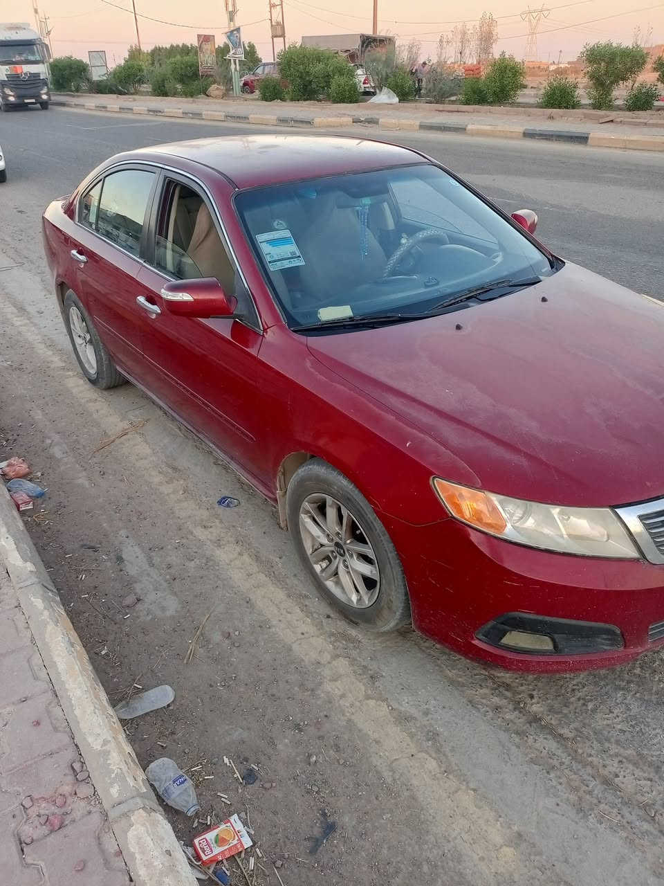 اوبتيما للبيع 2009 امريكي  محرك 2400  رقم قادسيه مكفوله ماعدا ضربه خفيفه الباب الخلفي  سياره جاهزه ونظيفه  رقم تلفون ***********  السعر 100 وبيها مجال
