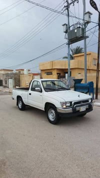 تويوتا ٢٠٠١ • رقم بغداد • خالية عيوب