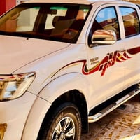 هايلوكس ٢٠١٢ • مشى ٢٢٥ الف • باب سائق مبدل