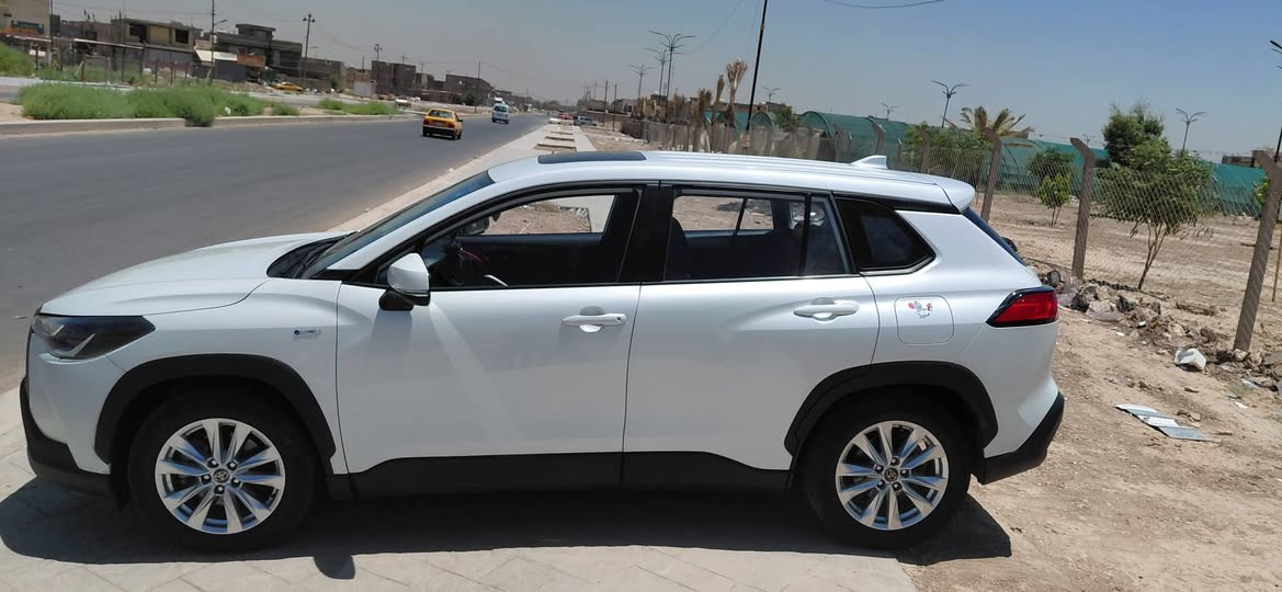 كورلا كروس 2025 
مكينه 2000cc بانزين+كهرباء 
فول موصفات 4 كامرات  360 درجه 
رادار امامي فتحه سقف
تحديد مسار .مثبت سرعه .تحكمات تحكمات ستيرن جهتين.  اوتو هولد .هاند بريك دكمه . 3 وضعيات قياده .  4 جامات +فتحه السقف اوتو . داخل لونين . تبريد قطعتين . بصمه ابواب . بصمه تشغيل عدد 2.
عداد الكيلوات  74000 
بارد خشم البنيد وصبغ عله كده +بارد ب قبق الجنه وصبغ ع كده 
الباقي وكاله 
 اماكن بسيطه وصورهن مووجودات مكان السياره الزعفرانيه 
*********** بغداد, العراق
