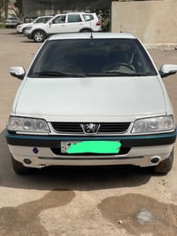 سيارة بيجو 405 السيارة كلش حلوه ونضيفه مثل ما واضح بالصورة رقمها بصرة ...