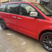 دوج كرفان 2014وارد امريكي sxt1.أبواب كهرباء 2.جنطة كهرباء  شاشةاعطال ....