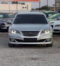 أزيرا 2011 السعر 105   وارد امريكي  ضرر جاملغ الأيسر  محرك 3800 فول عد...