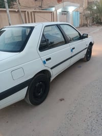 بيجو 405 • ٢٠١٢ • ورق