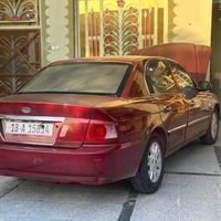 كيا اوبتيمه • ٢٠٠٥ • رقم دولي