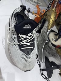 اصلي • قياس ٤٢ ونص • توصيل