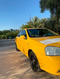 أوبترا موديل ٢٠٠٤ السياره صبغ جديد صدر جديد مكينه وكلج وكير جديد تبريد...