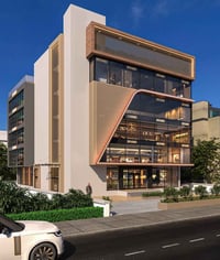 بناية تجارية • وسط شارع ٤٠ • نصف للبيع ١٢٥م