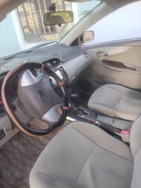 كورلا 2008 للبيع رقم بغداد محرك 1800 جاهزه من كلشي نضيفة حدادية جديد و...