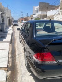 لانسر ٢٠١٣ • سنوية باسمي • ما بيها دينار