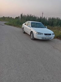 كامري للبيع موديل 2004.محرك v6  السياره  بيهه جامرلغ تعديل و مصبوغه عا...