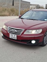 ازيرا 2011 • امريكي • فول مواصفات