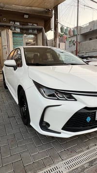 عندي سيارة كورله2024 هايبرد سياره بيهه بارد بالجاملغ امامي عكس السايق ...