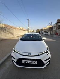 كورلا هايبرد 2024 شكل S  ماشية 32,000 المواصفات: فتحة سقف  بصمه  قطعتي...