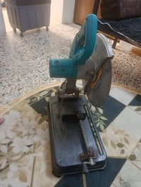 كتر حدادي نوع ماكيتا ياباني حجم القرص 350 بلادي فقط دكمه التشغيل مبدله...