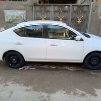 نيسان سني مصري موديل 24 ماشية 23ونص السعر 122ورقة مكفولة كير محرك كهرب...